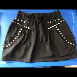 Black studded mini skirt